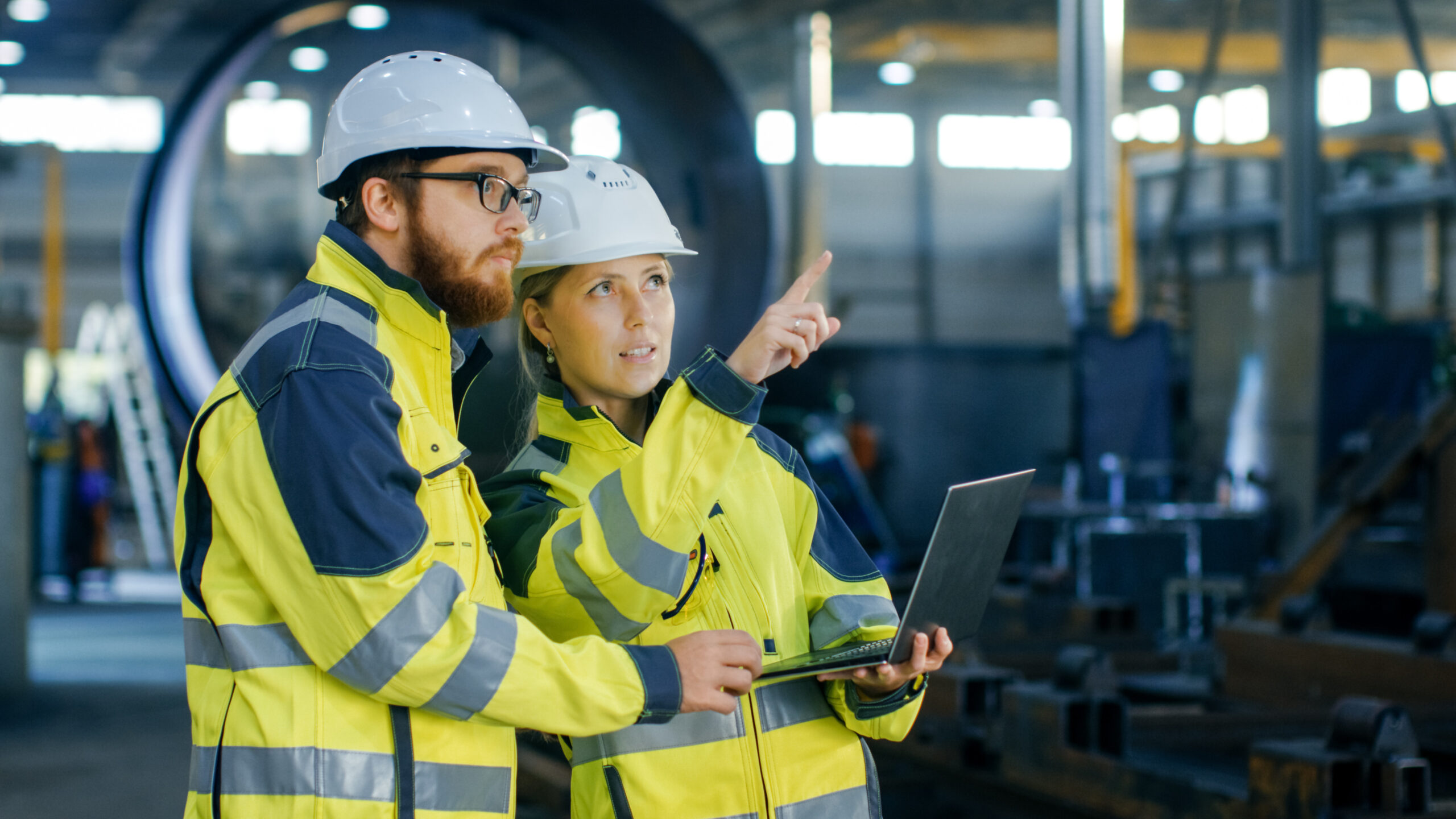 Construction worker wearing PPE workwear – body measurement for industrial sizing